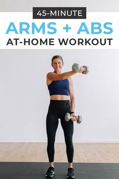 a woman holding two dumbs while standing in front of a wall with the words, 45 - minute drop set at home workout