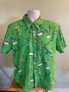 This shirt is in excellent condition with no defects of any kind. Clean from a smoke free place. Traditional Fit. Front button pocket and collar. Has a small button on the back of collar. Length is 30 inches with shirt tail. Chest 48 inches. Button down collar measures 17 inches. Fitted Green Collared Camp Shirt, Green Collared Camp Shirt With Button Closure, Green Camp Shirt With Buttons For Spring, Spring Green Camp Shirt With Buttons, Green Camp Shirt With Buttons And Camp Collar, Green Button-up Camp Shirt, Green Camp Shirt With Camp Collar, Green Camp Shirt With Buttons, Retro Green Button-up Shirt