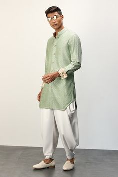 Sage green front open kurta with thread embroidery all over and printed cuffs. Paired with a white dhoti pant. - Aza Fashions Festive Cotton Kurta With Embroidered Cuffs, Cotton Kurta With Embroidered Sleeves For Festivals, Festival Cotton Kurta With Embroidered Sleeves, Festive Kurta With Embroidered Cuffs, Dhoti Pants For Men, Kurta With Dhoti, Jaal Embroidery, Men Kurta, Dhoti Pants