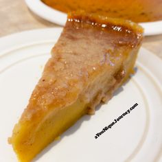 a piece of pie sitting on top of a white plate