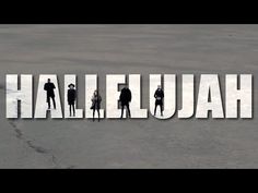 people standing in front of the word halifuah on top of snow covered ground