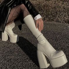 Off-white faux leather calf-height chunky platform boots! These have a slim stretchy calf with side zipper and a platform that will elongate your leg and edge up any outfit. Perfect for all the holiday stuff. Runs true to size White Faux Leather Knee-high Boots For Fall, White High Heel Mid-calf Trendy Boots, White High Heel Mid-calf Boots, White Wide Calf High Heel Knee-high Boots, White Wide Calf Knee-high Boots With High Heel, White Wide Calf Knee-high Heeled Boots, Fitted High Ankle Platform Boots, Fitted High Ankle Platform Boots In Polyurethane, Fitted White Platform Boots For Fall