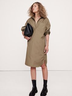 We reimagined our Oversized Shirt in a midi-length, inviting you to style it either as a dress or as a swim coverup.  We cut this one in our signature cotton poplin, a fabric we love for its crisp, soft feel against the skin.  Oversized fit with dropped shoulder.  Point collar with button placket.  Troca shell buttons.  Chest and side seam pockets.  Shirttail hem with slits at sides.  Unlined.  Oversized fit with dropped shoulder.  Long sleeves.  Midi length.  Model: Size S, 5'10" (178cm). Swim Coverup, Mommy Style, Shell Buttons, Shirtdress, Oversized Shirt, Cocktail Dress Party, Cotton Poplin, Women's Dresses, T Shirt Dress