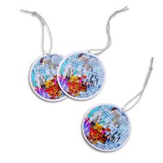 pair of round earrings with colorful mosaic tiles on the front and back of each ear