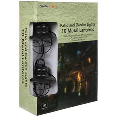 two garden lights in a box with the cover open and it's light on