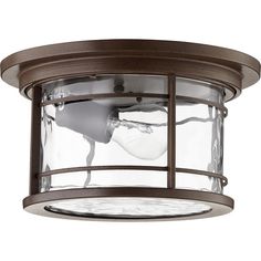 an outdoor ceiling light with clear glass panels on the top and bottom half of it