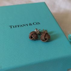 Tiffany & Co. Sterling Silver Knot Earrings. They Need To Be Polished But Otherwise In Great Condition. Comes With Bag, Box And Polishing Cloth Tiffany And Co Link Earrings, Bamboo Hoop Earrings Sterling Tiffany, Tiffany And Co Earrings Tiffany & Co., Tiffany Diamond Earrings Tiffany & Co., Tiffany And Co Earrings, 1960s Tiffany & Co. Jewelry, Knot Earrings, Tiffany & Co., Jewelry Earrings