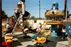 children are playing in an amusement park