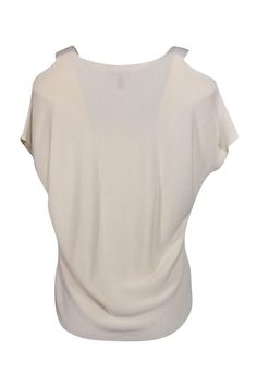 This soft and versatile top could be yours! Made with a stretchy, ribbed knit, this top from Eileen Fisher features a cold-shoulder design. Pair this is with some high-rise flared jeans for a fun, bohemian inspired look. Size XS 100% Tencel Ribbed, stretch knit Cold-shoulder design Short sleeved V-neck neckline No closures Waist 32" Total length 29" Shoulder Design, Flared Jeans, Eileen Fisher, Flare Jeans, Cold Shoulder, Knit Top, Ribbed Knit, High Rise, V Neck