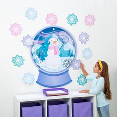 This frosty scene features pastel-colored snowflake cutouts and a snow globe with an image of a smiling snowman dressed in a colorful scarf and earmuffs. This classroom decoration will add a touch of outdoor, snowy fun to the indoors during wintertime. Cardstock. (13 pcs., 5 sheets per unit) Sheets, 16" x 24 1/2". Simple assembly required. © OTC Wall Statement Piece, Heart Shaped Crayons, Wall Statement, Snowman Dress, Snowflake Cutouts, Wonder Land, Crayon Set, Teaching Supplies, Coloring Supplies