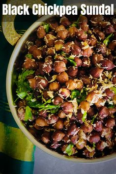 a white bowl filled with black chickpea salad