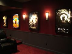 a movie theater with posters on the wall