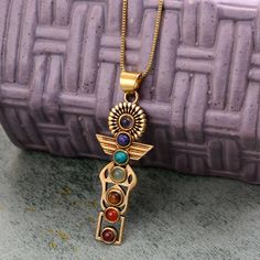 7 Stone Pendant Ancient Egypt jewelry, Egyptian jewelry, antique jewelry, historical vintage jewelry, Handmade Designer Colorful Pendant Handmade Material:- Brass ♥ Customer satisfaction is our biggest priority, please contact us with any questions/queries for future or existing orders, and we will do our best to make sure you are happy with your order. ♥ Please Make Sure to Include The Correct Address During Before Ordering. You Can return the Item within 30 Days After Successful Delivery. We offer a 100% Money Back Guarantee If You Are Not Satisfied With Your Purchase. Return Charge Will Be Paid By Buyer Only. ♥ The ring can be customized on request and the gemstone can be made to any gem you want. The same Design Ring Is Upload With Any Gemstone. Please Visit Our Shop to View the Comple Vintage Gemstone Jewelry For Jewelry Making, Bohemian Antique Gold Jewelry For Vintage Collection, Antique Multi-stone Ceremonial Jewelry, Gold Multi-stone Spiritual Necklace, Antique Gold Multi-stone Jewelry, Antique Multi-stone Gold Jewelry, Gold Spiritual Necklace With Multi-stone, Ceremonial Gold Multi-stone Necklace, Gold Multi-stone Necklace With Spiritual Style