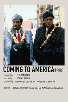 two black men standing next to each other in front of a poster with the words coming to america on it