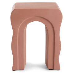 a small pink stool with an arch design