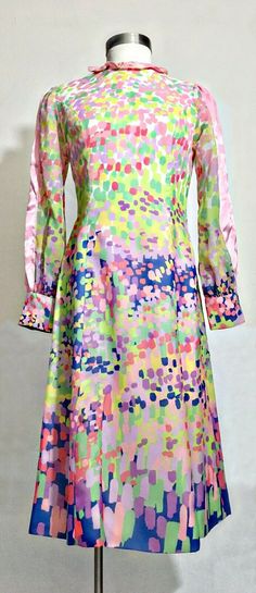 Vintage 1970's POSH by Jay Anderson Pastel Dress Abstract Spring Floral This dress is amazing!!  Brightly colored pastels create a gradient from top  to bottom of abstract, impressionist-like flowers.  Long sleeves, with a fabric button cuff.  A strip of pink satin goes down each sleeve.  Pink satin collar. A zipper closure at the back.  The sleeves and bodice are made of a  sheer-like polyester.  The bodice is lined in white. The skirt part is made of a satin crepe.   Measurement Laying Flat: S Pastel Dress, Pink Satin, Spring Floral, Jay, Bodice, 1970s, Long Sleeve Dress, Long Sleeves, Pastel