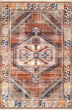 an old rug with geometric designs on the front and back sides, in various colors