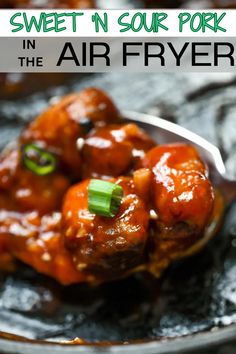 sweet and sour pork in the air fryer on a plate with text overlay