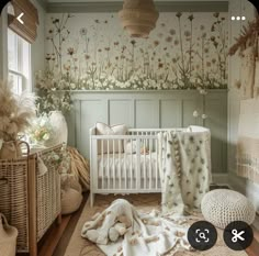 a baby's room with flowers and plants on the wall, including a crib