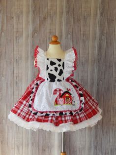 This beautiful dress is perfect for a birthday Farm theme party . The dress is made with 100% cotton fabric and all attention to detail This dress is made with 2 skirt layers, it has a farm appliqué with a birthday number that looks so cute on the dress just perfect for your little angel. The Dress is available from sizes 2 -8 years and available with a birthday number. Girls size Chest 2T 19'' 3T 21'' 4T 22'' 5T 23'' 6 24'' I use an underskirt just to show how puffy is the dress. if you want a Birthday Farm Theme, Farm Girl Outfits, Skirt Layers, Cow Dress, Woman Costumes, Animal Dress, Farm Dress, Farm Themed Birthday Party, 3 Birthday