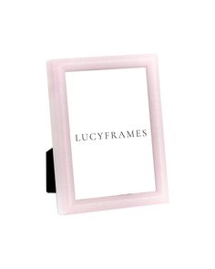 a pink frame with the word lucyframes written on it in black lettering