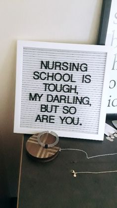 a sign that says nursing school is tough, my daring but so are you