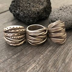 Three unique and powerful statement rings. The 3 of them are made in a braided, overlapping style that creates this unique chunky silver rings. Perfect everyday rings, that will rock your outfits, and are easy to match any other accessories. In one of the pictures, you can see which number represents each ring. Ring 1 is a size 8.5 Ring 2 is a size 8 Ring 3 is a size 8 All unique addition to your ring collection. To see more unique silver rings, click the link below https://www.etsy.com/shop/Aka Thick Silver Ring, Male Ring, Rings Chunky, Tibetan Ring, Silver Pinky Ring, Mantra Ring, Chunky Silver Rings, Unique Silver Rings, Thumb Rings Silver