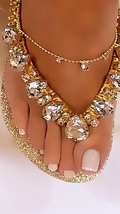 Glamorous Gold Sandals With Adjustable Fit, Adjustable Glamorous Gold Sandals, Glamorous Adjustable Gold Sandals, Bling Open Toe Sandals For Beach, Party Sandals With Glitter And Adjustable Fit, Adjustable Glitter Sandals For Party, Gold Rhinestone Flip Flops For Vacation, Gold Sparkling Sandals For Summer, Glamorous Gold Beach Sandals