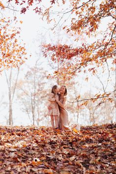 Mom and daughter in the fall leaves! Fall Photoshoot Ideas Mom And Daughter, Fall Mother And Daughter Photos, Mommy Daughter Fall Photoshoot, Mother And Daughter Fall Photoshoot, Mom And Kids Fall Photoshoot, Mother Daughters Fall Photoshoot, Mother And 2 Daughters Photoshoot, Mom And Daughter Fall Photoshoot