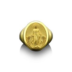 Miraculous virgin mary in 14k gold signet ring for men, Oval mens signet ring in 18k gold, Christian gold ring for dad Your Religious solid gold Miraculous Virgin Mary ring is stylish and pretty ideal for everyday use. Engraving details of  handmade gold ring are very detailed and eye-catching. This meaningful rings with high quality handwork will be a legacy you can leave to your family with its quality. ★Item Details * Material : 10K & 14K & 18K Solid Gold * Ring Diameter : 2.10cm ( 0.80 Inches ) * Ring Weight:    10K = 8.00 Grams   14K = 9.00 Grams   18K = 11.00Grams *Listing photos taken with 18K Gold products. Gold products color finished may change with carat variants which is 10K and 14K products. You can look our customers photo reviews for gold products color tones. ✔ Ready to Shi 14k Gold Oval Signet Ring For Commemoration, Oval 14k Gold Signet Ring For Commemoration, Oval Yellow Gold Signet Ring For Commemoration, Oval Signet Ring With Polished Finish For Commemoration, Oval Hallmarked Signet Ring For Commemoration, Gold Oval Engraved Ring For Commemoration, 14k Gold Signet Ring, Meaningful Rings, Handmade Gold Ring