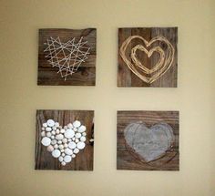 four pieces of wood are arranged in the shape of hearts and string work on them