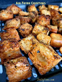 grilled potatoes and onions on a grill with text overlay that reads air fryer croutons