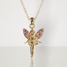 This fairy princess gold necklace is beautifully crafted with pink jewels on the wings. A fabulous gift idea. Gold chain. Suitable for children age 3 and over. Chain length 71/2 in. Baby Bible, Earth Baby, Pink Jewels, Fairy Necklace, Fairy Princess, Fairy Princesses, The Wings, Girls Jewelry