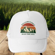 This awesome vintage sunset over rocky mountains in nature makes a great image for a set of customized hats for a family reunion, road trip, or summer vacation. Commemorate the occasion with matching hats for mom, dad, brother and sister. Just add your own last name and the year with our personalization tool in hunter green. White Trucker Hat Baseball Cap For Travel, White Trucker Hat For Travel, Adjustable White Hats For Camping, Adjustable White Hat For Camping, Adjustable White Trucker Hat For Camping, White Snapback Trucker Hat For Camping, Personalized Trucker Hat For Outdoor, White Camping Cap, White Baseball Cap For Camping