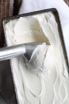 a scoop of ice cream in a metal container