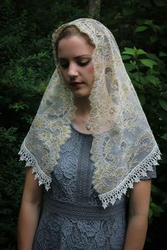 Evintage Veils~ A traditional gold/white mantilla veil, edged with an elegant Venise lace trim . It measures about 46 X 24 inches. A classic and traditional veil. Sewn-in clip is included with this veil. And, of course, it comes with our our complimentary organza bag! Convo us with any questions you may have, and Blessings! Our veils are custom made for you! Please see the Shipping & Returns section for our current processing times. Traditional Gold Lace For Wedding, Traditional White Veil, Traditional Veil, Mantilla Veil, Chapel Veil, Lady Of Fatima, Gifts For My Wife, Free Sewing, Handmade Design