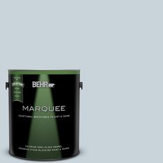 the behr marquee paint is dark brown and has a green tint