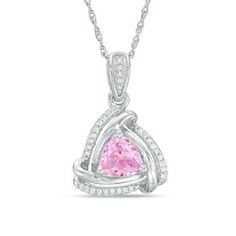 Bring on the bling with this sparkling fashion pendant. Crafted in sterling silver, this dainty drop features a 6.0mm trillion-cut lab-created bright pink sapphire wrapped in a swirling triangular frame of polished and diamond-accented ribbons. Buffed to a brilliant luster, this pendant suspends from a diamond-accented bail along an 18.0-inch rope chain that secures with a spring-ring clasp. Trillion Cut Sterling Silver Jewelry With Diamond Accents, Silver Jewelry With Trillion Cut Diamond Accents, Silver Trillion Cut Jewelry With Diamond Accents, Zales Zales, Fashion Pendant, Peoples Jewellers, Sapphire Stone, Pink Stone, Steampunk Fashion