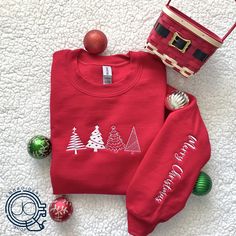 Personalized Christmas Tree Embroidered Sweater - Festive Holiday Sweater Celebrate the holiday season with our cozy sweater featuring four beautifully embroidered Christmas trees on the chest and the phrase "Merry Christmas" delicately stitched on the left sleeve. Choose your favorite thread color, and we'll use it for both the trees and the sleeve text, creating a unique and personalized holiday look. Perfect for holiday gatherings, gift-giving, or adding festive cheer to your wardrobe. ☻ High Genius Hour, Personalized Christmas Tree, Embroidered Christmas, Xmas Trees, Machine Embroidery Projects, Christmas Hoodie, Embroidery Shop, Aesthetic Stuff, Christmas Hoodies