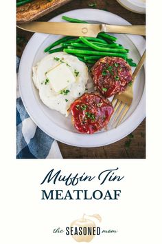 a white plate topped with meat and veggies