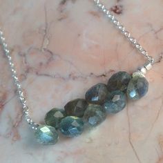 *Sterling Silver *Labradorite- a stunning stone, unfortunately extremely hard to photograph properly. Flashy and lovely. My favorite stone. * Just over 17 inches *Bali silver accents Need more? Matching earrings? Just ask! Bali Silver, Coin Pearls, Rose Gold Metal, Wrapped Jewelry, Swarovski Earrings, Gift Jewelry, Silver Accents, Bar Necklace, Wire Wrapped Jewelry