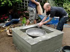 two men working on an outdoor fire pit in the yard with text that reads, awesome making a fire pit with hovers