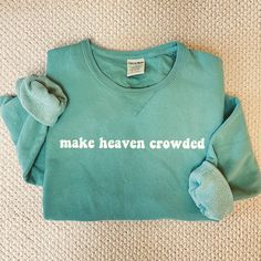 Make Heaven Crowded Crew Neck Fleece Sweatshirt, Christian Comfy Crew Neck Sweatshirt, Christian Sweatshirt, Jesus Crewneck, Fall Sweatshirt This Crewneck Fleece Sweatshirt is perfect for colder weather and can easily be dressed up or dressed down! It is super cozy and comfortable for everyday wear! Unisex Sizes: S-3XL FOLLOW ME ON SOCIAL MEDIA & tag me in your pictures wearing SimplyOrganizeCo apparel! Instagram- @simplyorganizeco TikTok- @simplyorganizeco Email- simplyorganizeco@gmail.com Pint Cotton Long Sleeve Sweatshirt With Slogan, Soft-washed Fleece Crew Top, Crew Neck Cotton Sweater With Slogan, Cotton Crew Neck Sweater With Slogan, Cotton Crew Sweater With Slogan, Soft-washed Fleece Crew Neck Top, Make Heaven Crowded, Jesus Clothes, Jesus Sweatshirts