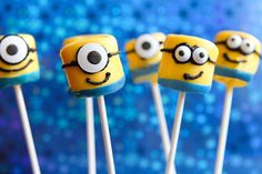 minion lollipops with googly eyes on them