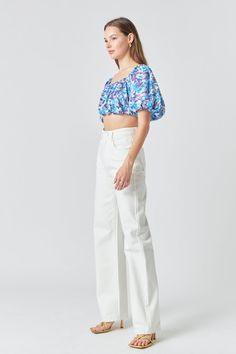 Amp up your everyday style with this pretty floral crop top. With a touch of femininity, this crop top is perfect for dressing up or down. The satin effect gives it a luxe feel, while the balloon hem and short balloon sleeves add a touch of whimsy. We can't wait to wear this top all season long. Dress it up with a skirt and heels or keep it casual with jeans and sneakers. Floral print Crop length Balloon hem Short balloon sleeves Hand wash cold Do not bleach Do not tumble dry Iron low Shell: 100% Polyester Lining: 100% Polyester TL544T Total length : 14.75" Bust : 33" XS BLUE MULTI: Height 5'9" / Bust 30.5" / Waist 24" / Hips 34.5" Short Balloon Sleeves, Floral Crop Tops, Balloon Sleeves, The Balloon, Everyday Style, Everyday Fashion, Long Dress, Bleach, Floral Print