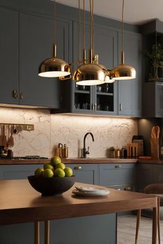 a kitchen filled with lots of counter top space next to a dining room table and chairs