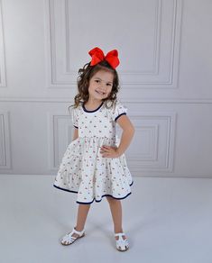 Serendipity Clothing Cherry Pie Charming Dress Style 23-36. Ready to ship! Sizing: Serendipity Clothing fits true to size. If you would like a personal measurement, please contact our shop at 214-517-0882. We offer matching bows & socks under accessories in our menu. Link: https://southernsweetchildren.com/collections/accessories Playful Sleeveless Dress With Bow, Casual A-line Dress With Bow, Spring Dresses With Bow And Short Sleeves, Cute Short Sleeve Dress With Bow, Casual White Dress With Bow, Short Sleeve Cotton Dress With Bow, Cute White Dresses With Bow Print, Casual Short Sleeve Dress With Bow, Playful White Dress With Bow