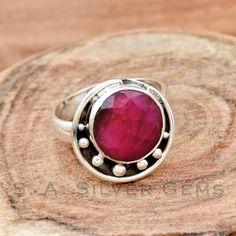 Indian Ruby Ring, 925 Sterling silver Ring, Moon Ring, Moon Design Ring, Wedding Band, Anniversary Ring, Handmade Jewelry, Gift For Her.   *Main Stone : Indian Ruby *Main Stone Color : Pink *Main Stone Creation : Dyed Gemstone *Metal : Sterling Silver *Base Metal : 925 parts per 1000 *Style : Ring Handmade Silver Round Ruby Ring, Adjustable Sterling Silver Ruby Ring, Silver Rings With Moon Phase, Sterling Silver Rings With Moon Phase For Anniversary, Sterling Silver Moon Phase Wedding Ring, Sterling Silver Ruby Ring With Bezel Setting, Adjustable Round Ruby Ring Stamped 925, Wedding Sterling Silver Round Ruby Ring, Round Sterling Silver Ruby Wedding Ring