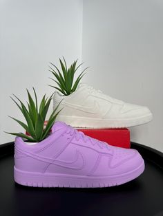 Kick it old school with our eco-friendly 3D printed Nike inspired Dunk Planter. This versatile piece is more than just a stylish decoration. It's a functional home accessory that can be used in countless ways. Elevate your sneaker obsession to new heights with this stunning, eco-friendly tribute to the iconic Nike Dunk! 3D printed from sustainable, plant-based PLA, this statement piece isn't just for your feet - it's a conversation starter for your side table, dressing room or desk. Showcase your love for sneakers and the planet with this unique work of art. Take your sneaker obsession to the next level! Order your eco-friendly Nike Inspired Dunk Planter! *Please Note Only 1 Planter Provided  *Please Note Plant/Pens Not Included This planter does not have a drainage hole, please take this Nike Inspired, Table Dressing, Room Desk, Gaming Room, Planter Pots Indoor, Birthday Gift For Him, Pen Holder, Nike Dunk, Dressing Room