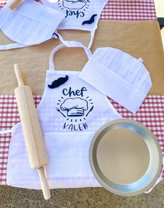 the aprons have been made to look like they are ready for baking on the table